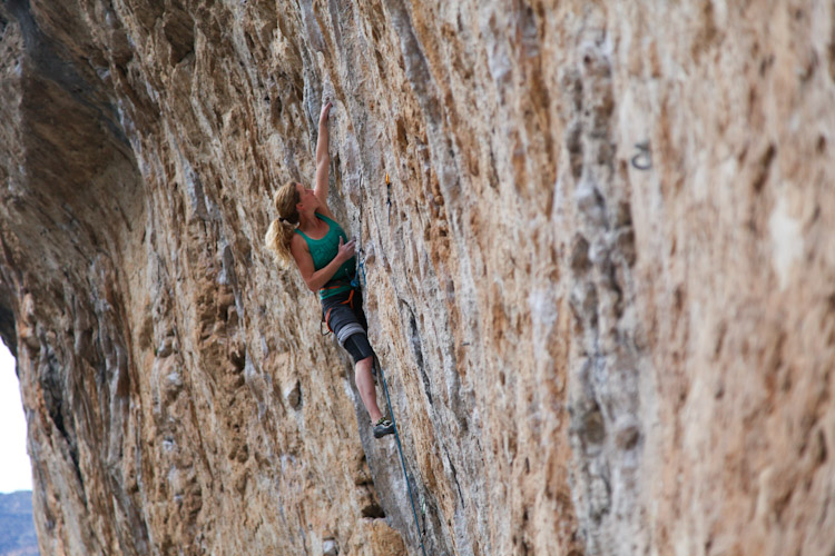 Rosie hiking to the top of Red Bull 13a. 