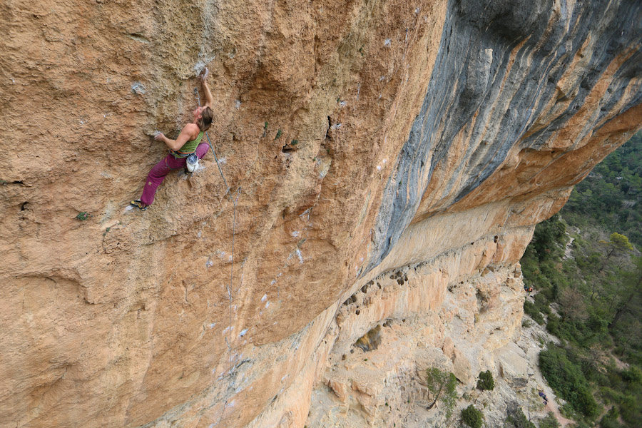 Florence Pinot climbing on Patinoso 8c+ in Siurana, Spain.  